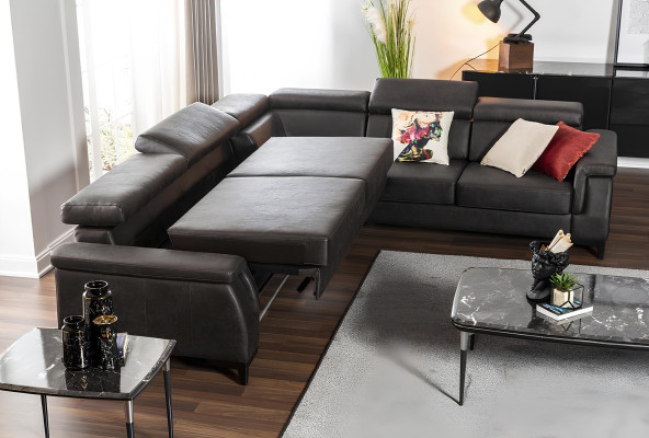 Ny sort L-formet sofa med sovefunktion