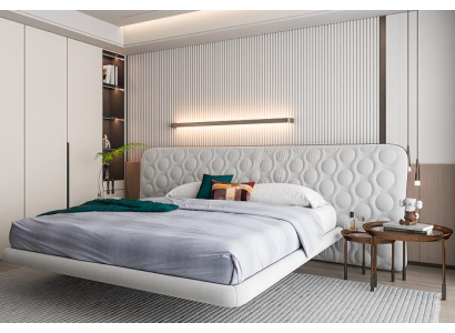 Moderne hvid polstret seng med minimalistisk rundt design