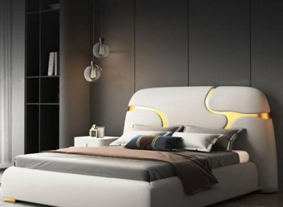 Moderne polstret seng i grå og guld