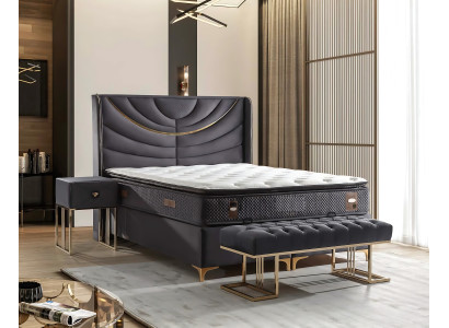 Elegant grå seng med stof- og trämadras