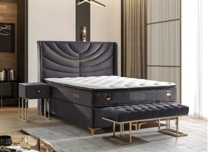 Elegant grå seng med stof- og trämadras