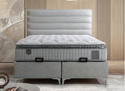 Moderne grå seng med elegant madras